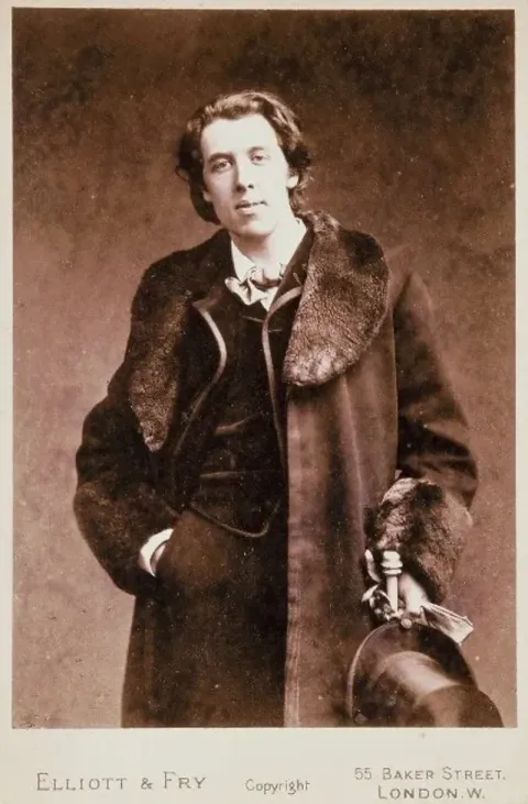 Oscar Wilde photographed by Elliott & Fry, London, 1881