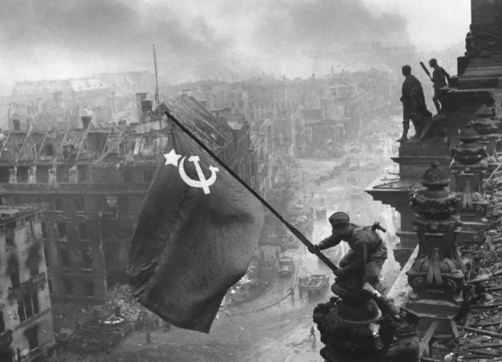Soviet soldiers raising the flag over the Reichstag, Berlin, May 1945