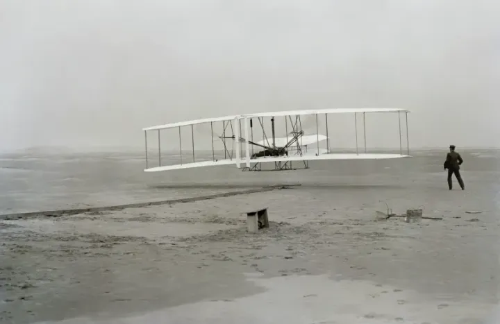 First flight of the Wright Flyer, December 17, 1903 — photograph by John T. Daniels