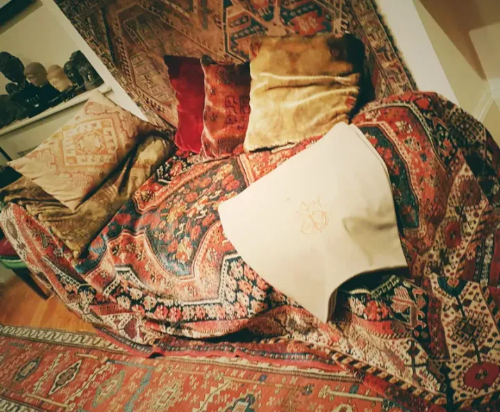 Freud’s psychoanalytic couch, draped in oriental rugs and cushions