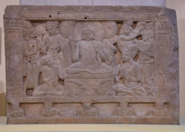 Limestone relief from Nāgārjunakoṇḍa depicting the First Sermon, c. 3rd–4th century CE